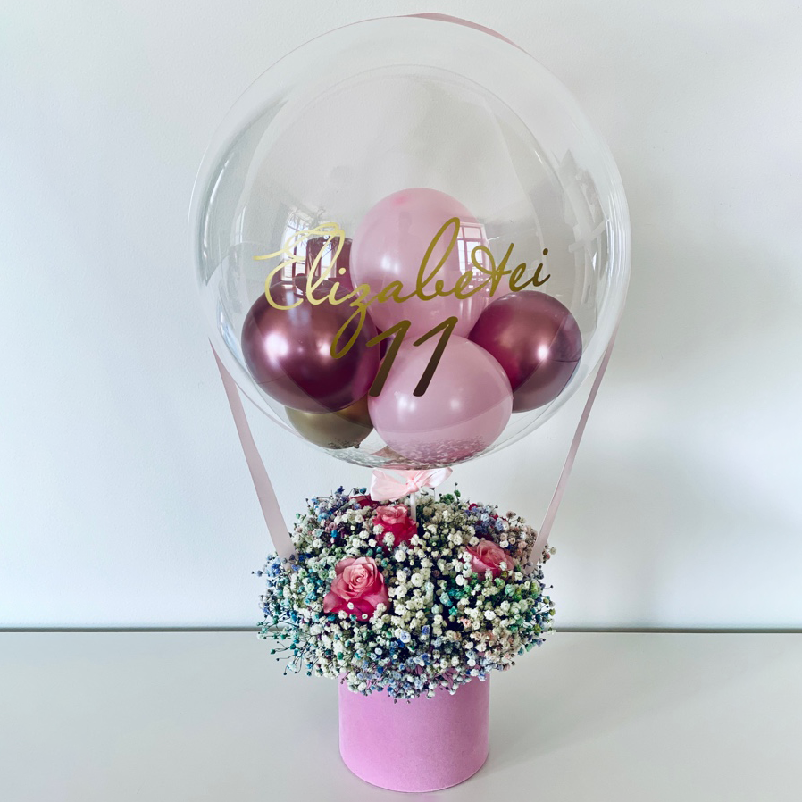 Ziedi Cepuru Kastē un Hēlija Balonu Kompozīcija "Rozā Mākonis"